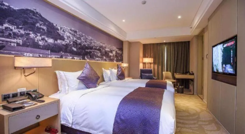 Bed in Sky World Hotel Qingdao