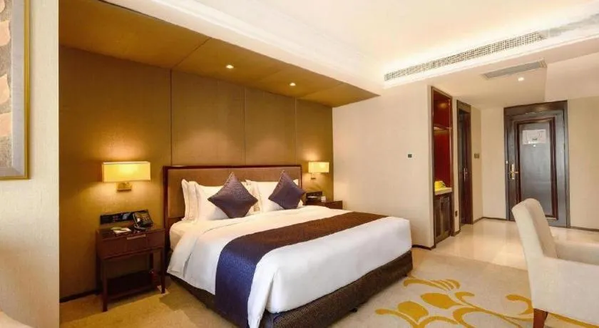 Bed in Sky World Hotel Qingdao