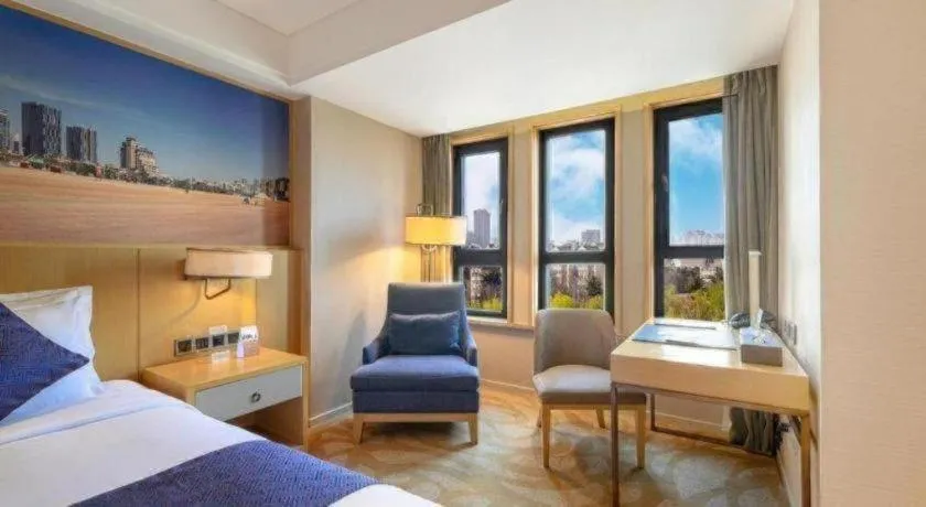 Bed in Sky World Hotel Qingdao