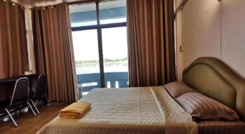 Bed in Just Mansion Hotel