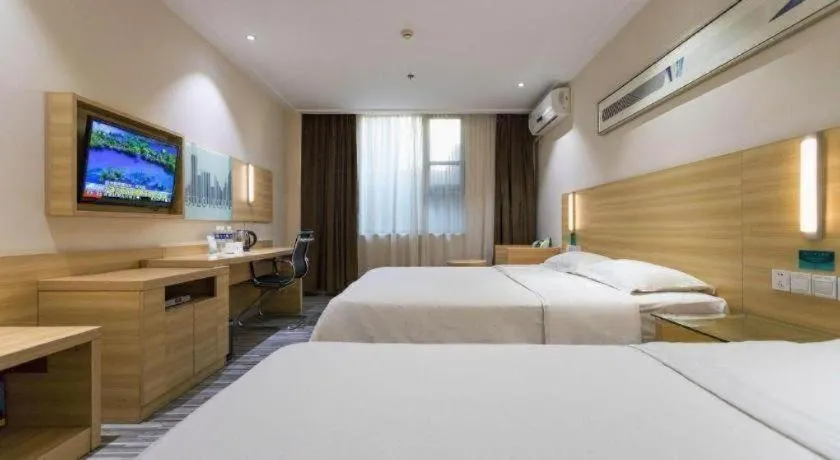 Bed in City Comfort Inn Huanggang Guibinlou Wanda Square