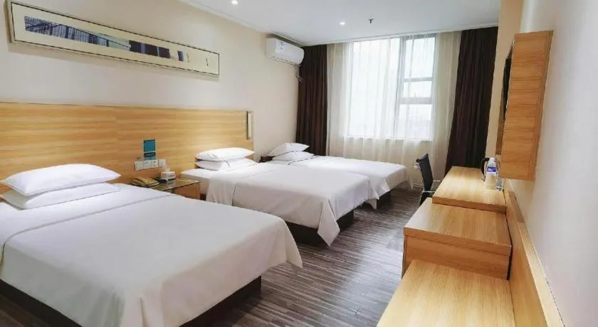 Bed in City Comfort Inn Huanggang Guibinlou Wanda Square