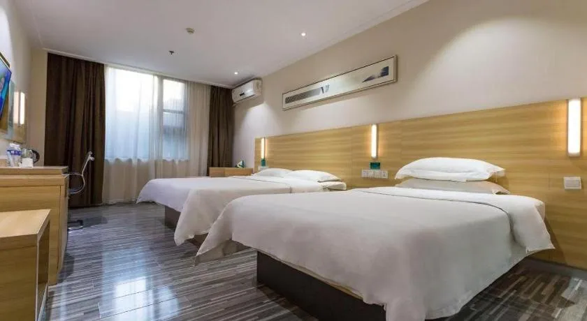 Bed in City Comfort Inn Huanggang Guibinlou Wanda Square