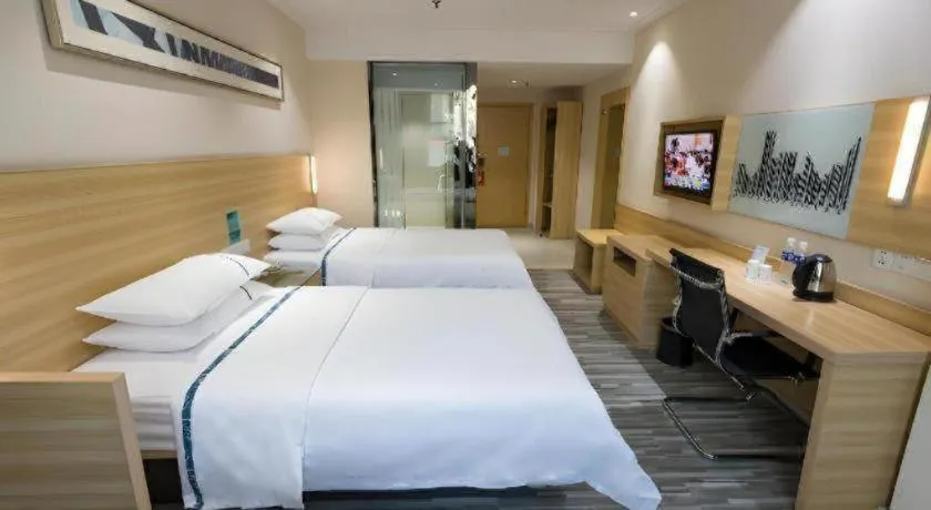 Bed in City Comfort Inn Huanggang Guibinlou Wanda Square