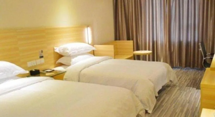 Bed in City Comfort Inn Huanggang Guibinlou Wanda Square