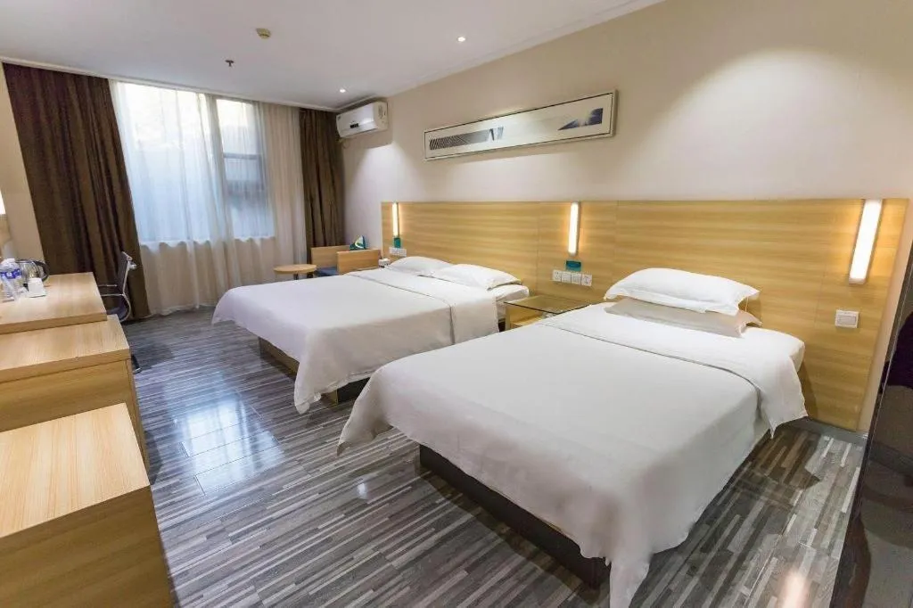 Bed in City Comfort Inn Huanggang Guibinlou Wanda Square