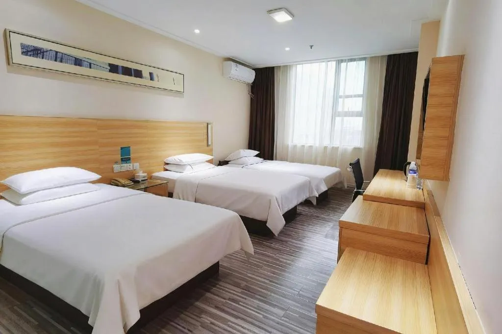 Bed in City Comfort Inn Huanggang Guibinlou Wanda Square