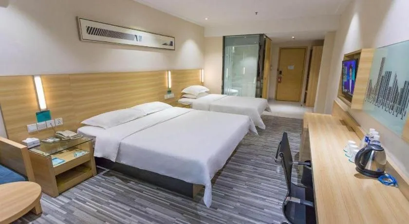 Bed in City Comfort Inn Huanggang Guibinlou Wanda Square