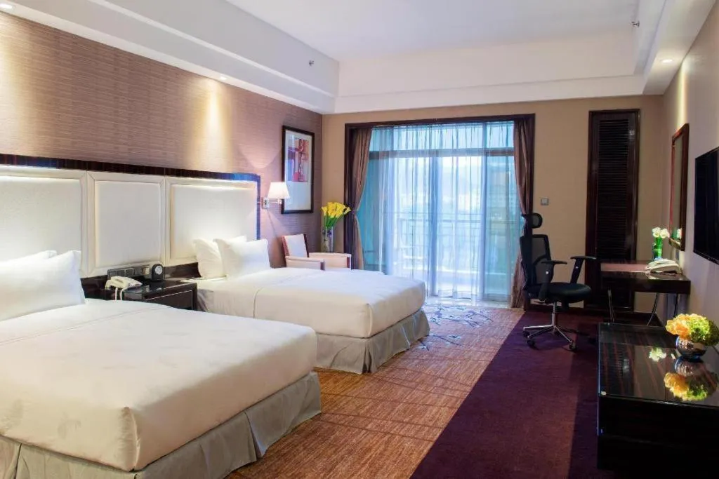 Bed in Country Garden Phoenix Hotel Shenyang