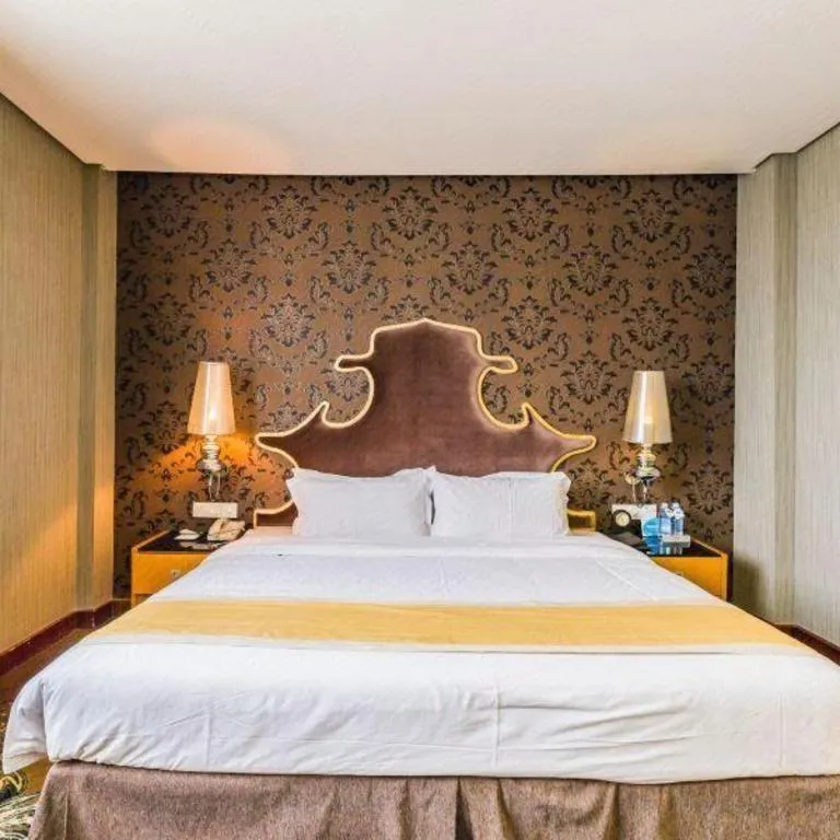 Bed in Foshan Nanhai Huifeng Holiday Hotel