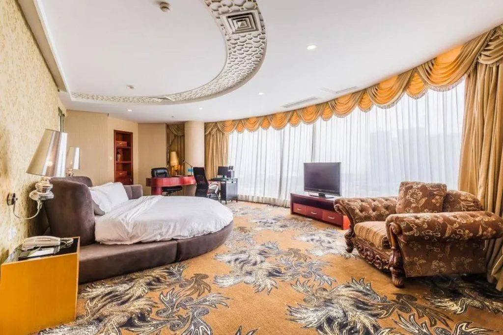 Bed in Foshan Nanhai Huifeng Holiday Hotel