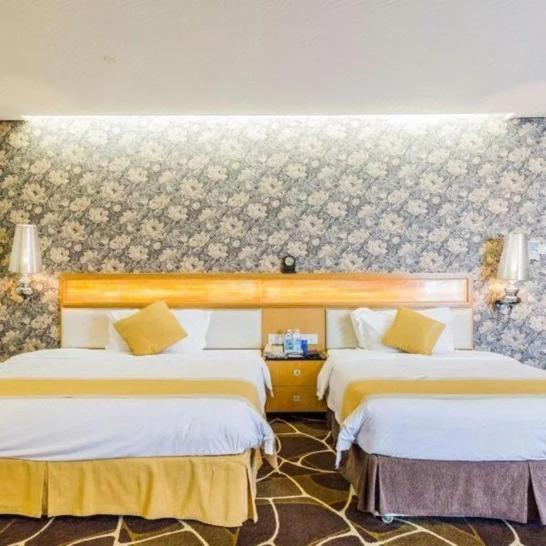 Bed in Foshan Nanhai Huifeng Holiday Hotel
