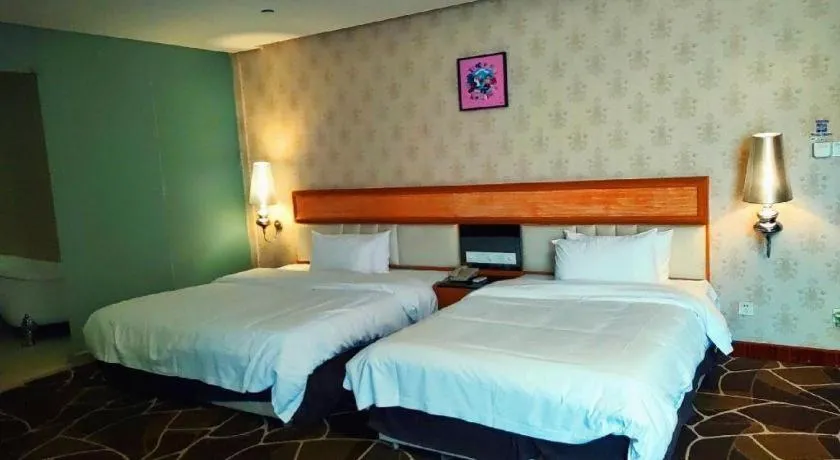 Bed in Foshan Nanhai Huifeng Holiday Hotel