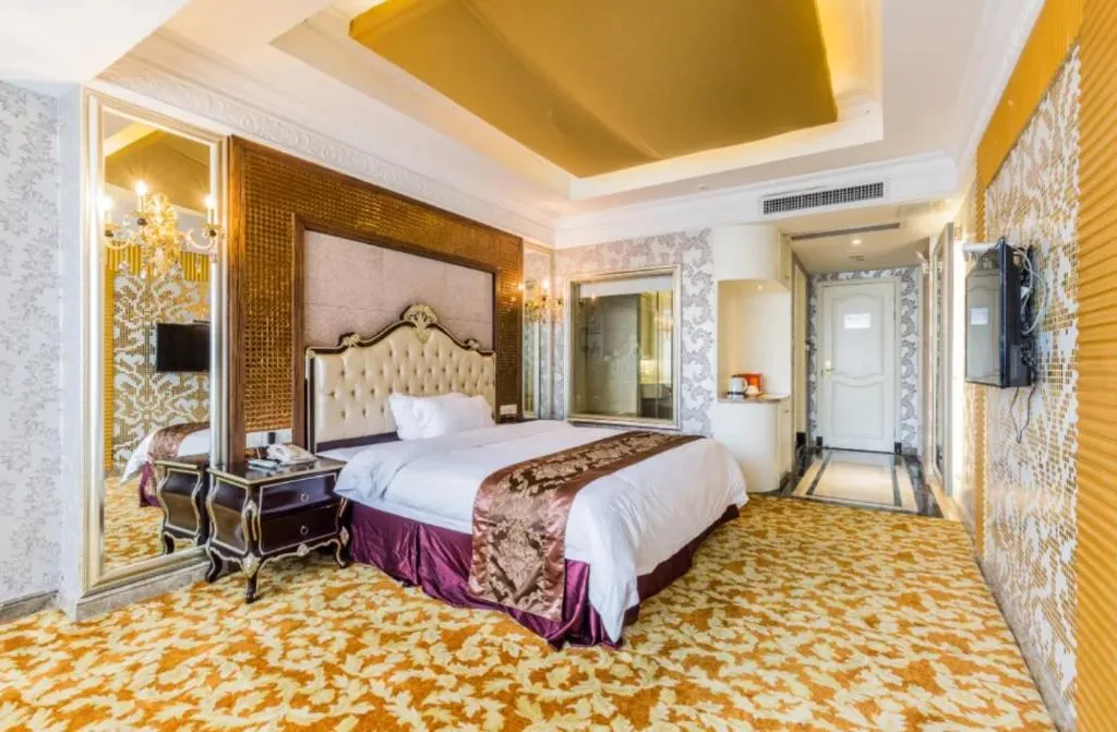 Bed in Foshan Nanhai Huifeng Holiday Hotel