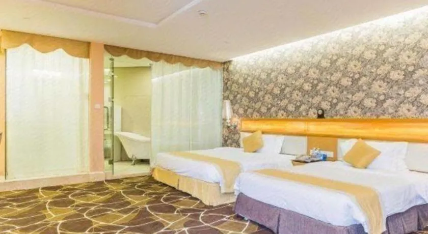 Bed in Foshan Nanhai Huifeng Holiday Hotel
