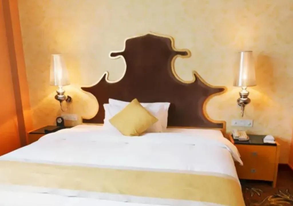 Bed in Foshan Nanhai Huifeng Holiday Hotel