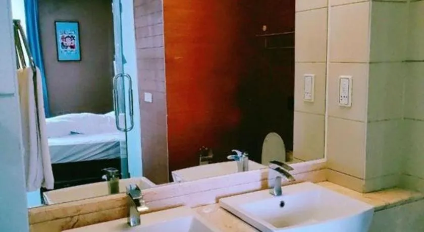 Bed in Foshan Nanhai Huifeng Holiday Hotel