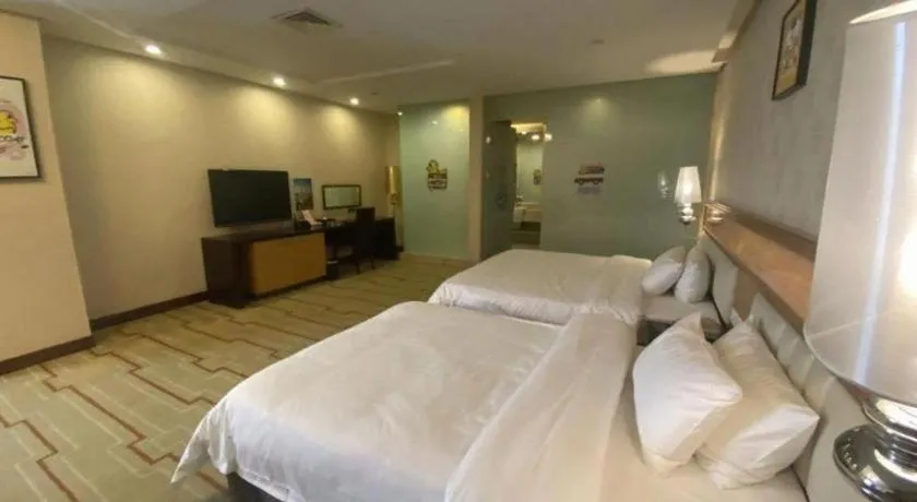 Bed in Foshan Nanhai Huifeng Holiday Hotel