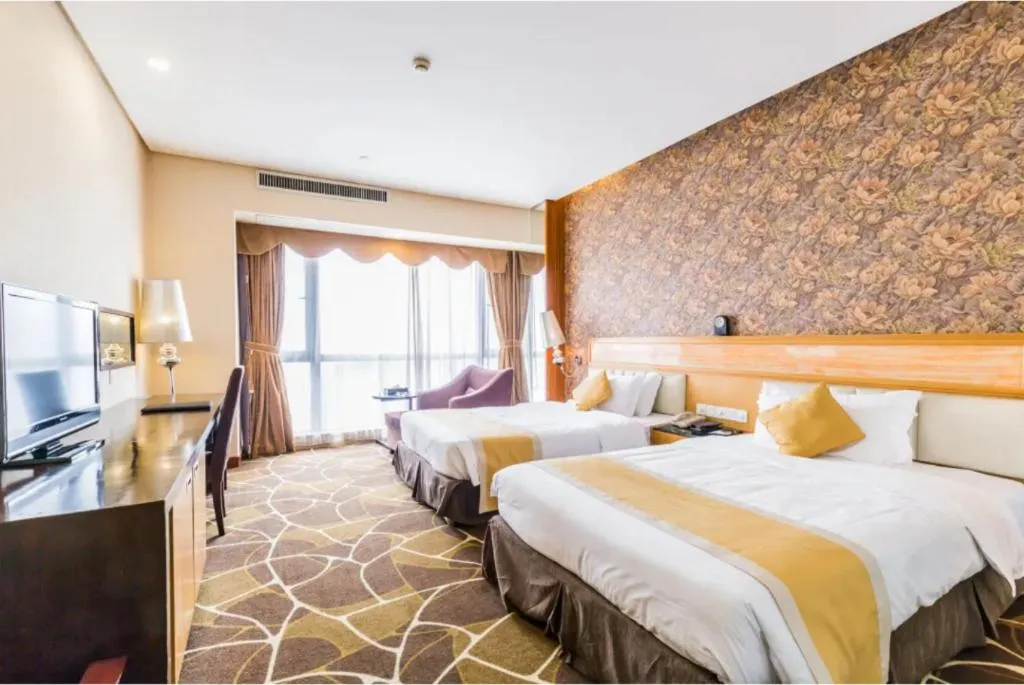 Bed in Foshan Nanhai Huifeng Holiday Hotel