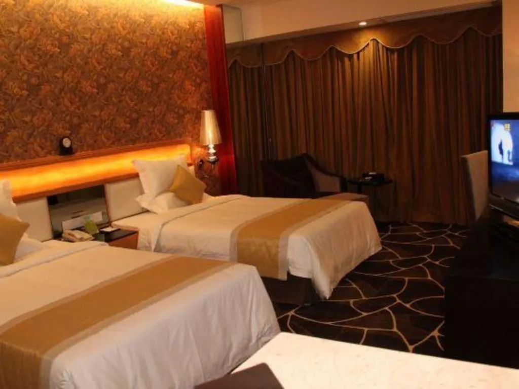 Bed in Foshan Nanhai Huifeng Holiday Hotel