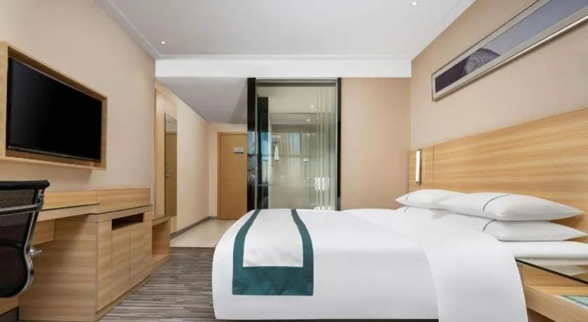 Bed in City Comfort Inn Liuzhou Chengzhong Wanda Plaza