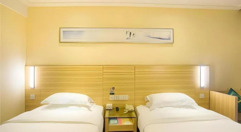 Bed in City Comfort Inn Liuzhou Chengzhong Wanda Plaza