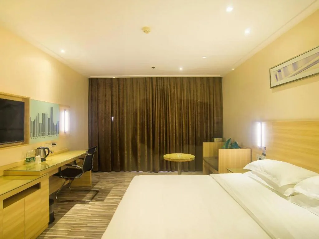 Bed in City Comfort Inn Liuzhou Chengzhong Wanda Plaza