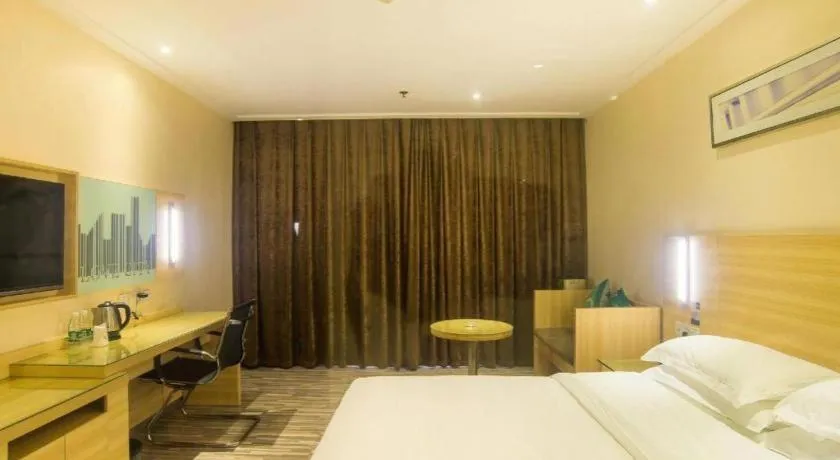 Bed in City Comfort Inn Liuzhou Chengzhong Wanda Plaza