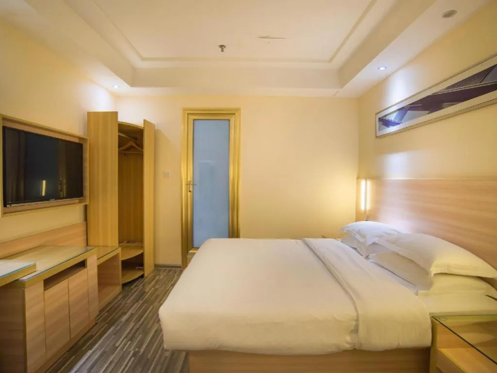 Bed in City Comfort Inn Liuzhou Chengzhong Wanda Plaza