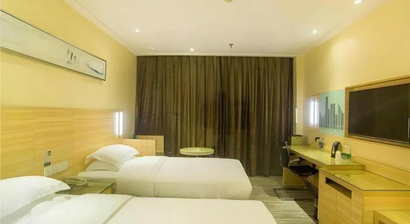 Bed in City Comfort Inn Liuzhou Chengzhong Wanda Plaza