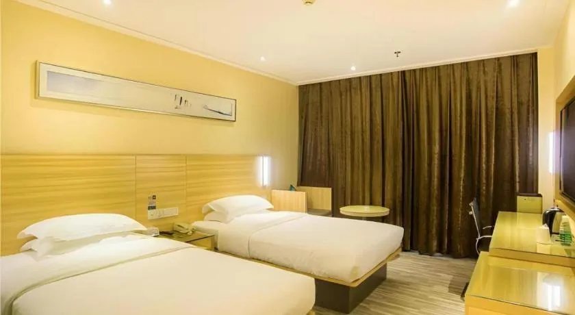 Bed in City Comfort Inn Liuzhou Chengzhong Wanda Plaza