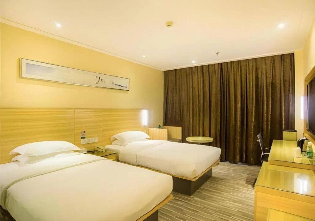 Bed in City Comfort Inn Liuzhou Chengzhong Wanda Plaza