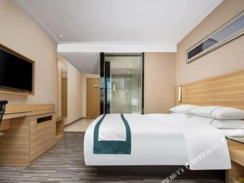 Bed in City Comfort Inn Liuzhou Chengzhong Wanda Plaza