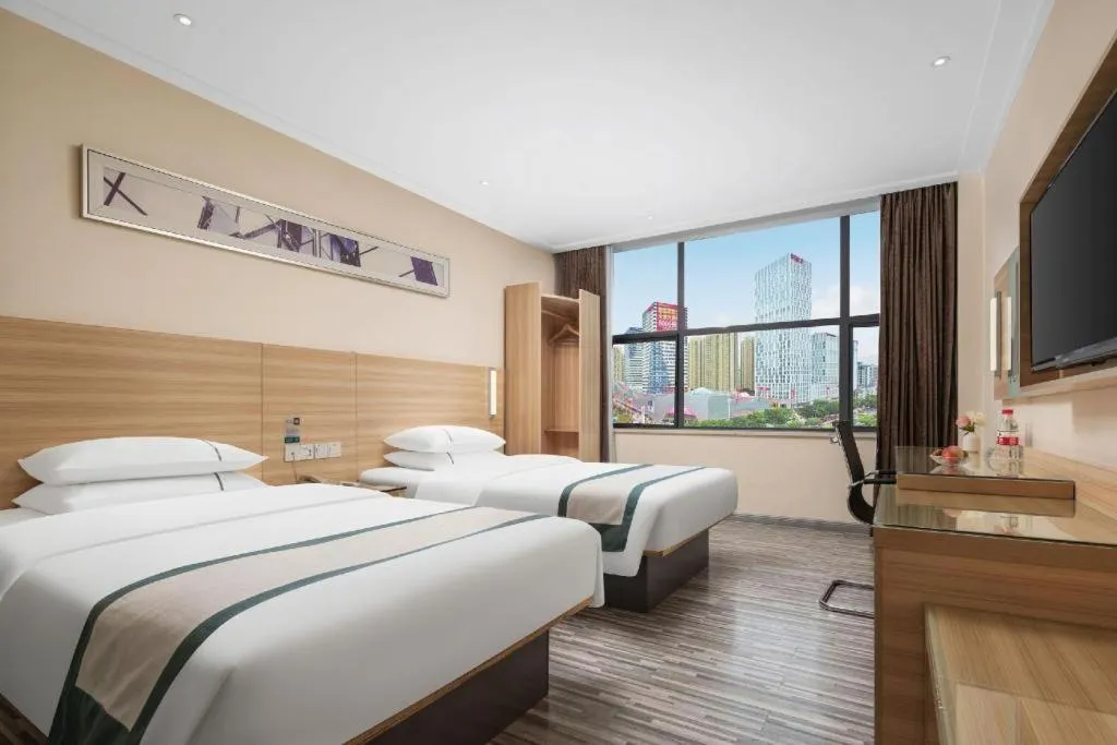 Bed in City Comfort Inn Liuzhou Chengzhong Wanda Plaza