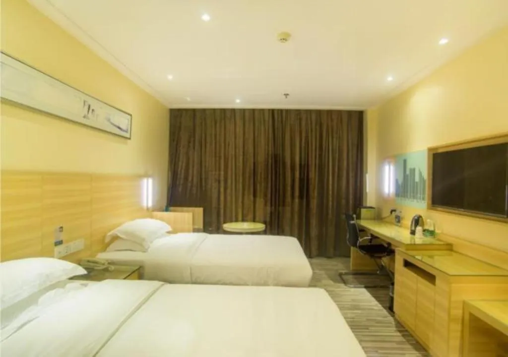 Bed in City Comfort Inn Liuzhou Chengzhong Wanda Plaza