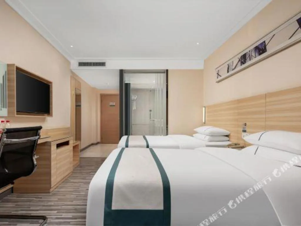 Bed in City Comfort Inn Liuzhou Chengzhong Wanda Plaza