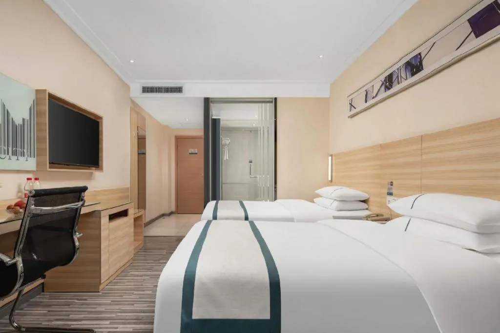 Bed in City Comfort Inn Liuzhou Chengzhong Wanda Plaza