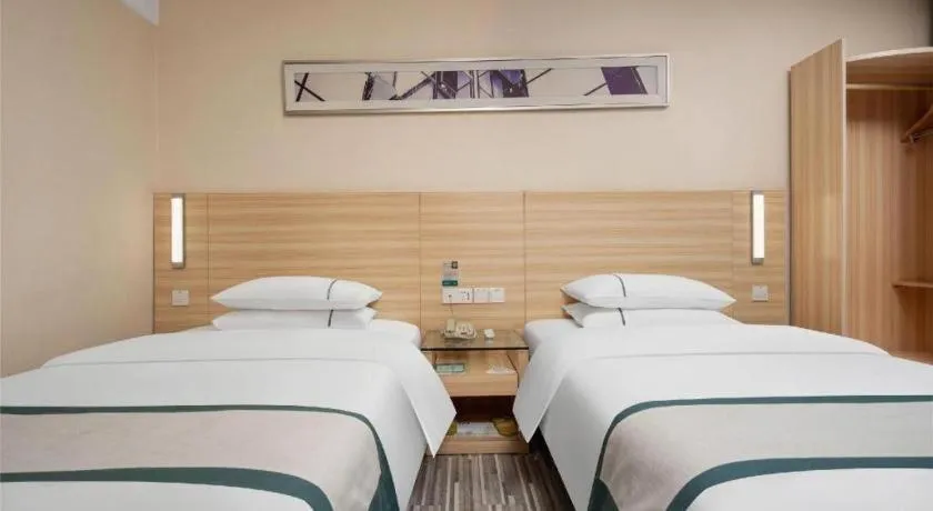 Bed in City Comfort Inn Liuzhou Chengzhong Wanda Plaza