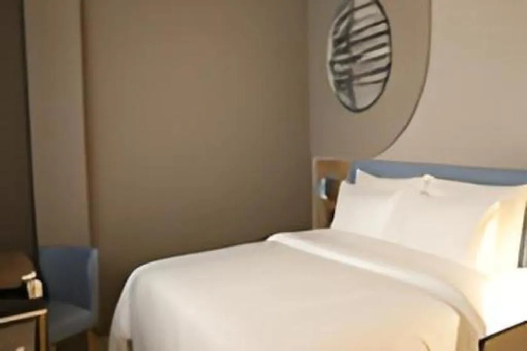 Bed in Home Inn Neo Shanghai Railway Station