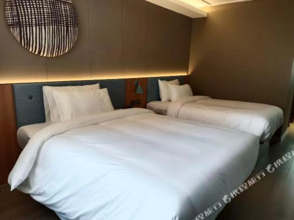 Bed in Home Inn Neo Shanghai Railway Station