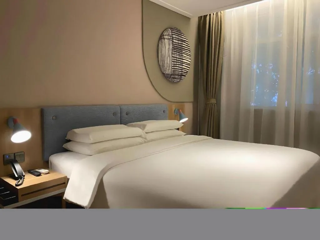 Bed in Home Inn Neo Shanghai Railway Station