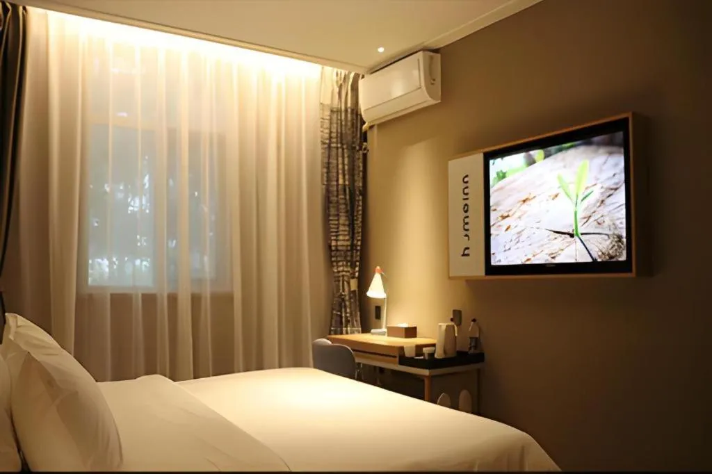 Bed in Home Inn Neo Shanghai Railway Station