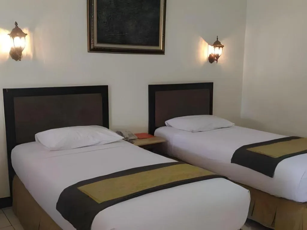 Bed in d'Arcici Hotel Plumpang