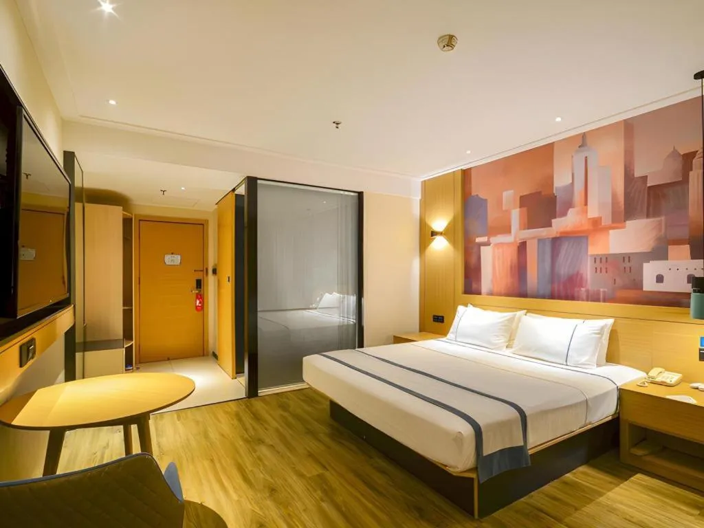 Bed in City Comfort Inn Wuhan Hanyang Street Caidian Square Metro Station