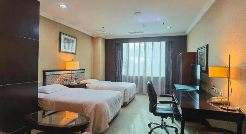 Bed in Changchun Zhuozhan Days Hotel