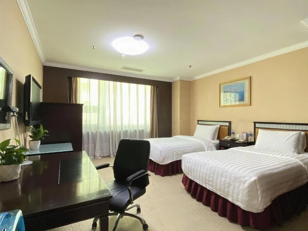 Bed in Changchun Zhuozhan Days Hotel