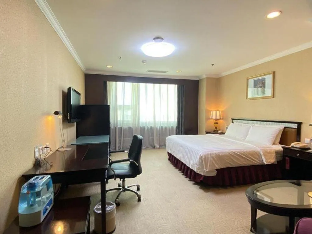 Bed in Changchun Zhuozhan Days Hotel