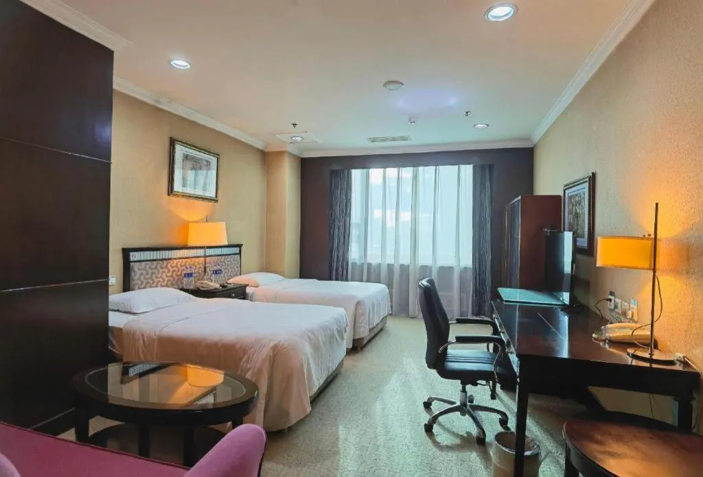 Bed in Changchun Zhuozhan Days Hotel