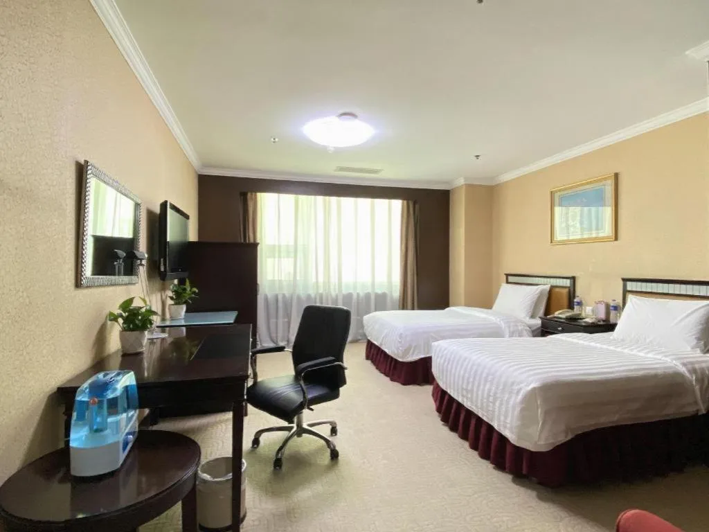 Bed in Changchun Zhuozhan Days Hotel