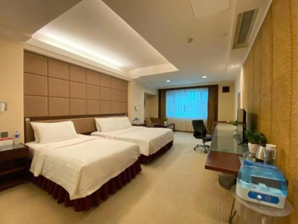 Bed in Changchun Zhuozhan Days Hotel